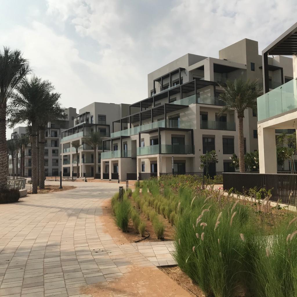 The apartments along a garden path
