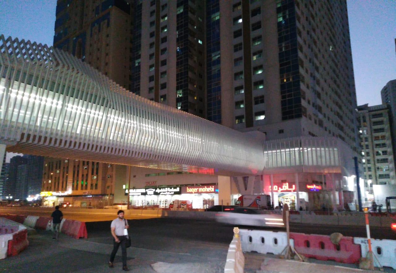 The bridge at night, with the fins lit from below