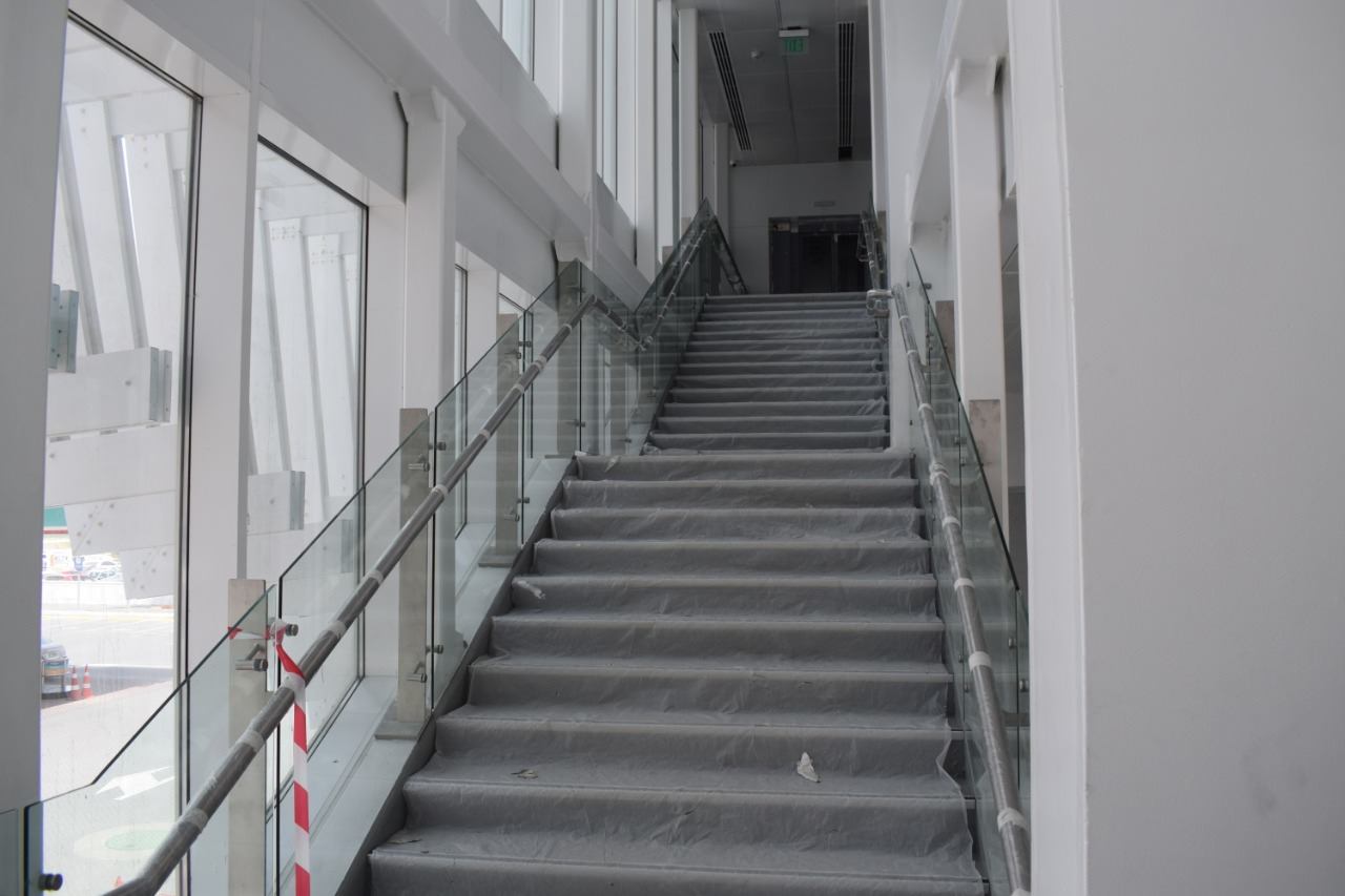 Glass balustrades and stainless steel handrails on the stairs