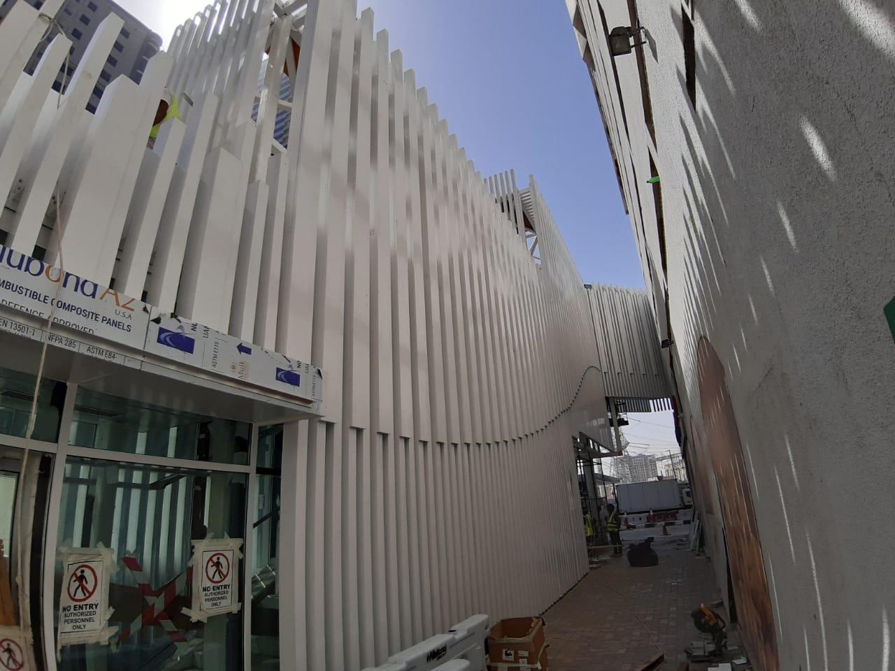 A stair tower behind the fins