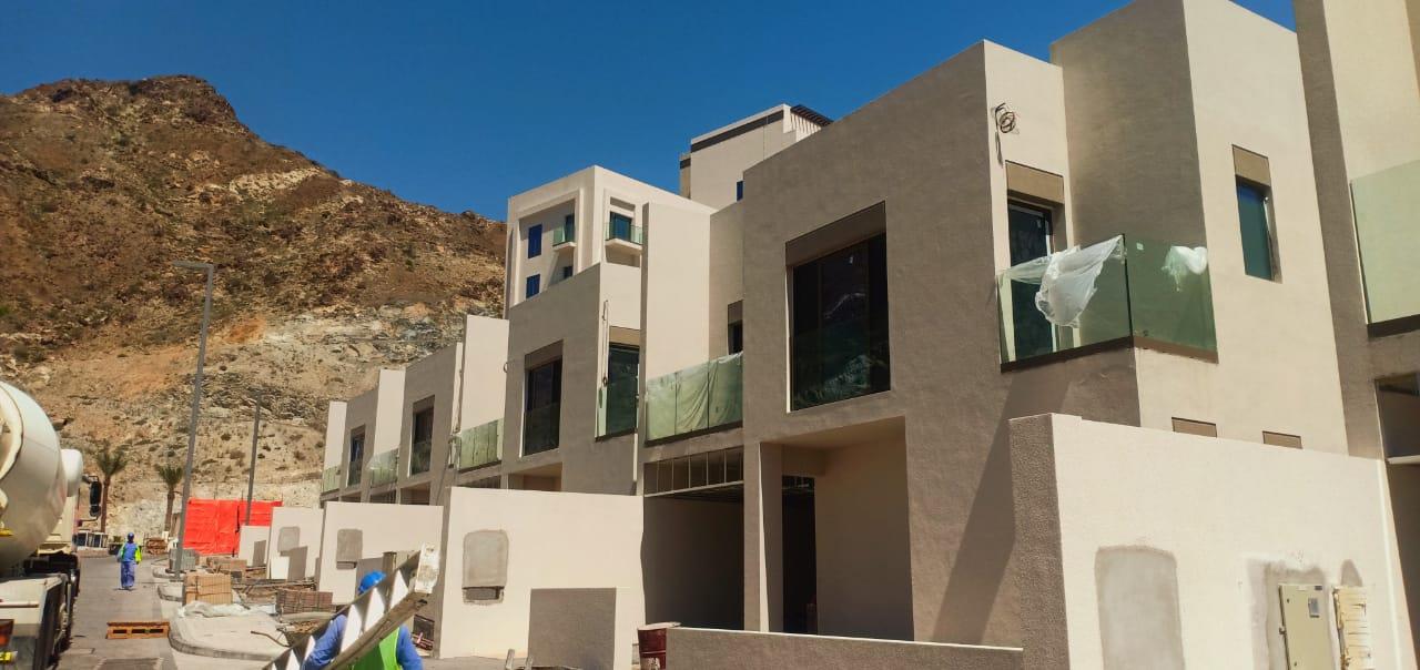 Beach villas with glass balconies