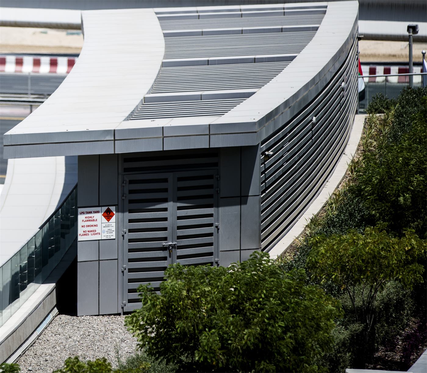A curved louvered plant room