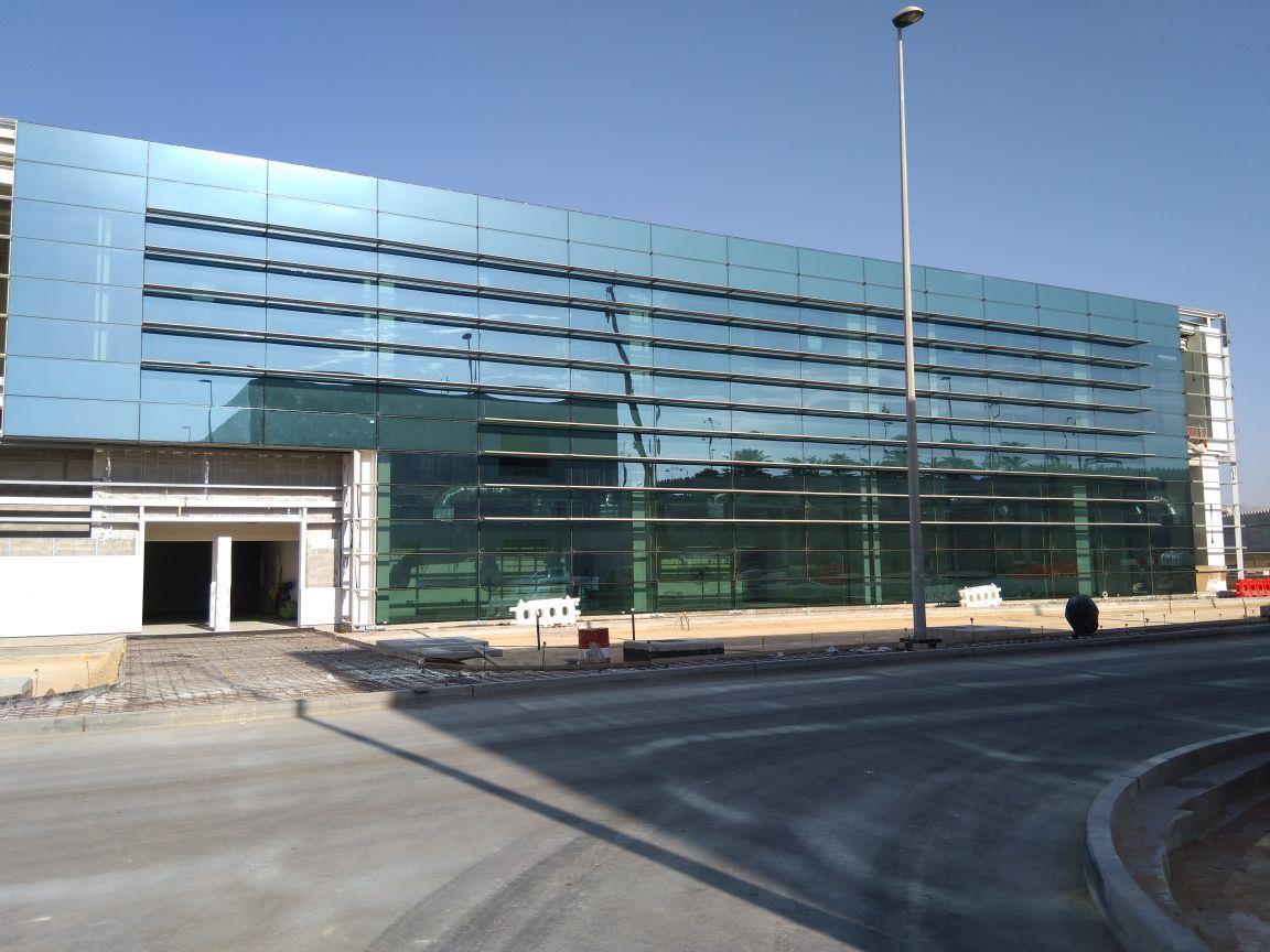 A glass curtain wall with horizontal fins