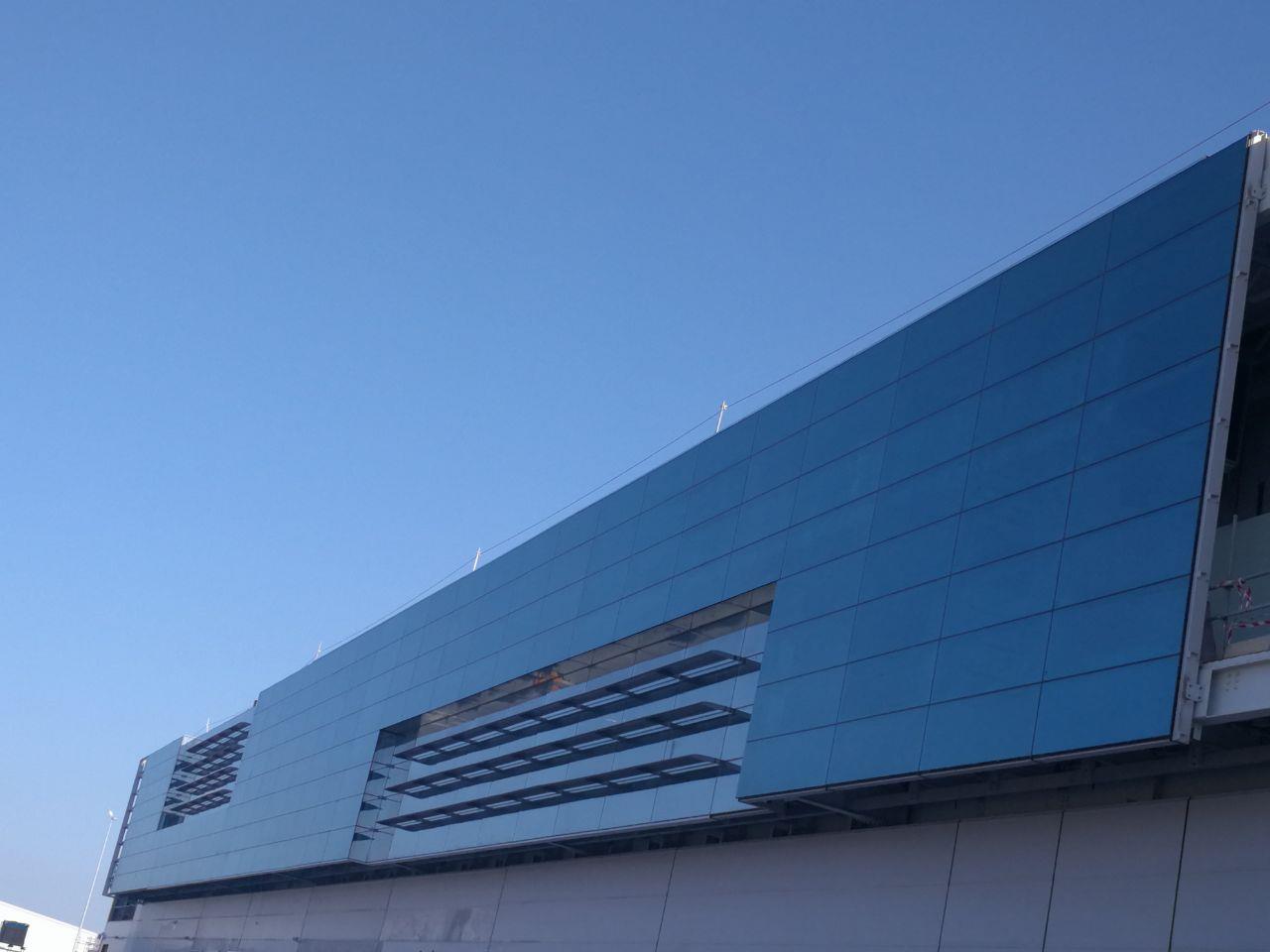 Blue glass with a band of louvers