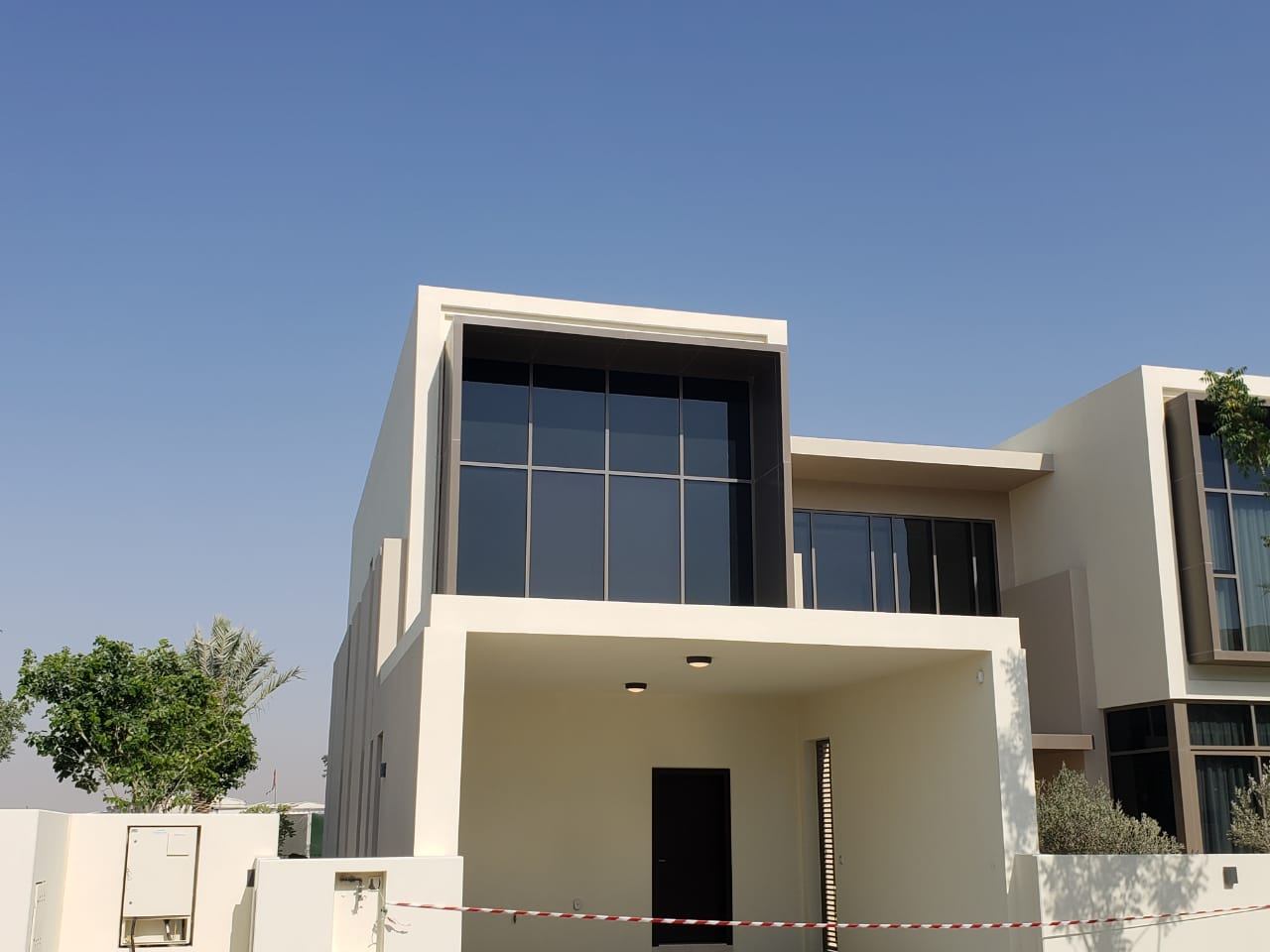 A villa with an ACP frame around the upper windows